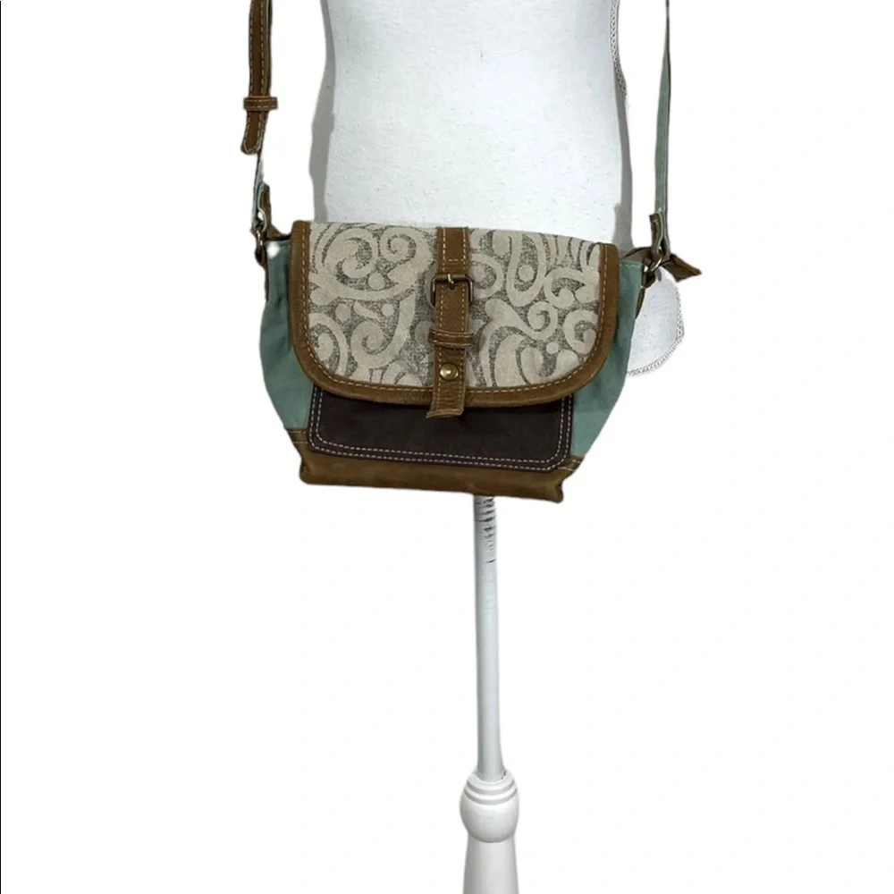 Myra bag Paisley swirl print small cross body bag canvas leather.